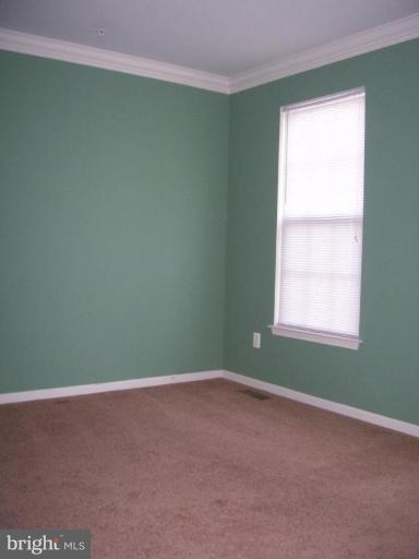 729 Compass Road East Middle River, MD 21220 - Photo 3 of 10 a view of empty room with window