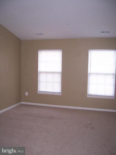 729 Compass Road East Middle River, MD 21220 - Photo 5 of 10 an empty room with a window