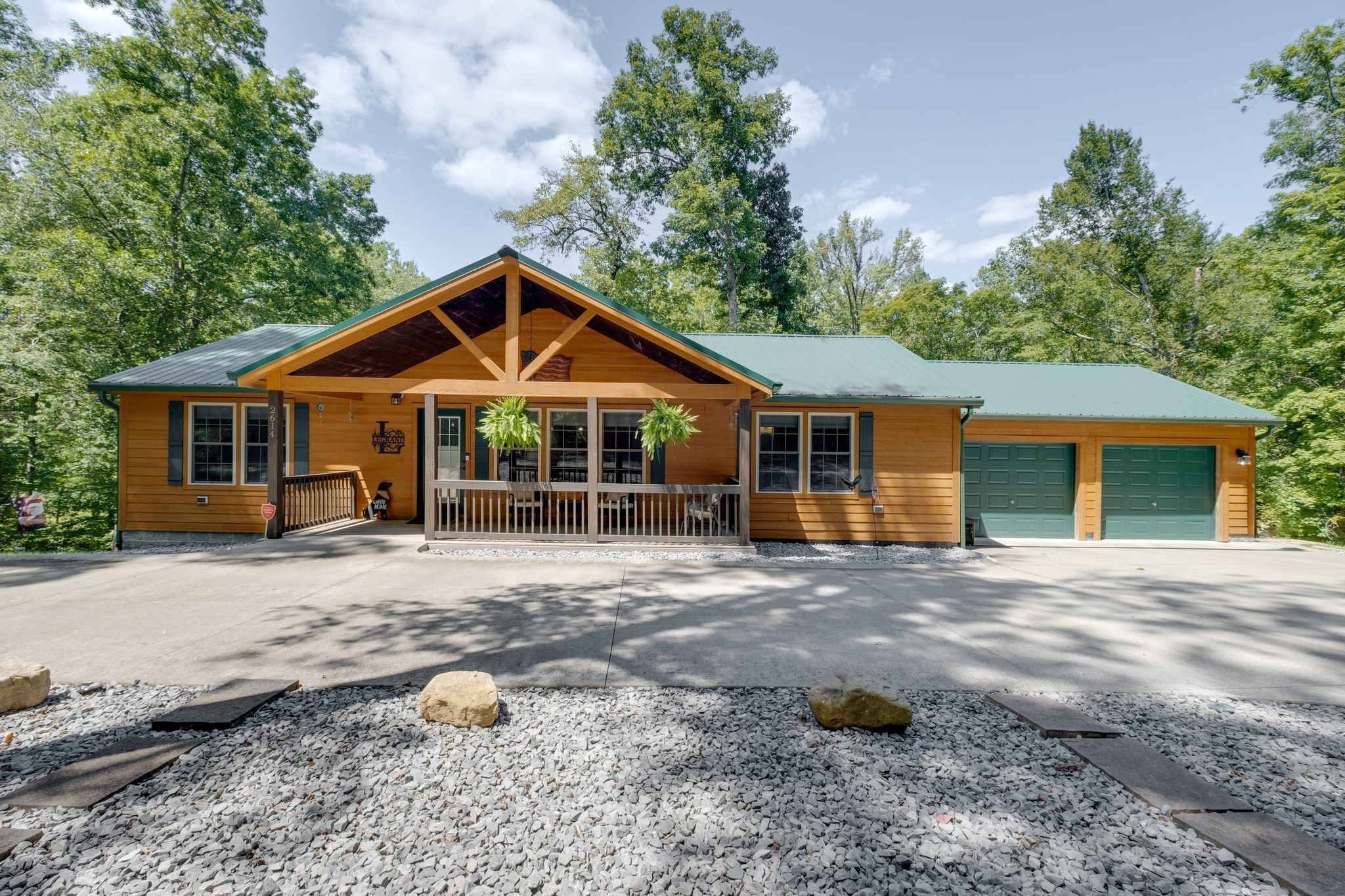 2614 Distillery Road Greenbrier, TN 37073 - Photo 1 of 34 a front view of a house with garden