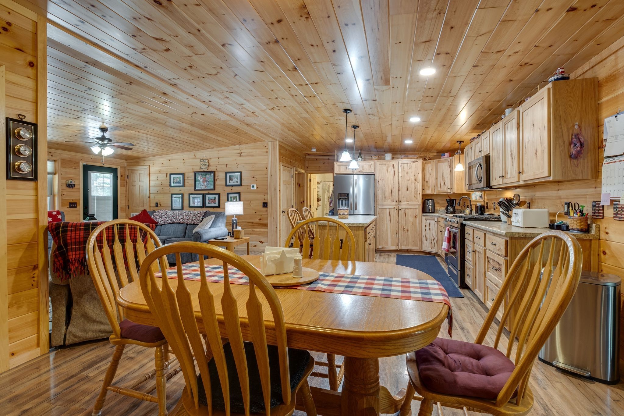 2614 Distillery Road Greenbrier, TN 37073 - Photo 14 of 34 a dining room with furniture and a chandelier