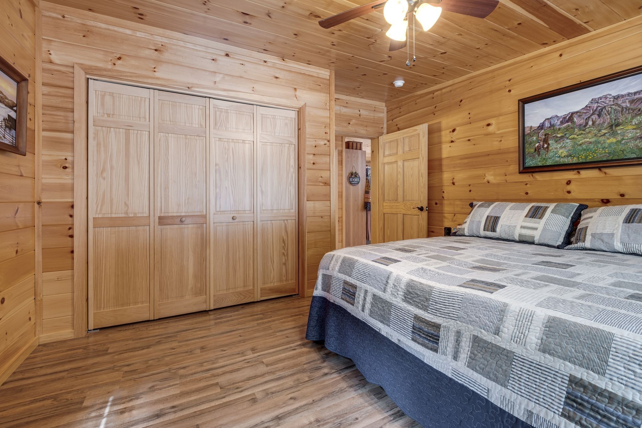2614 Distillery Road Greenbrier, TN 37073 - Photo 21 of 34 a bedroom with a bed and a painting on the wall