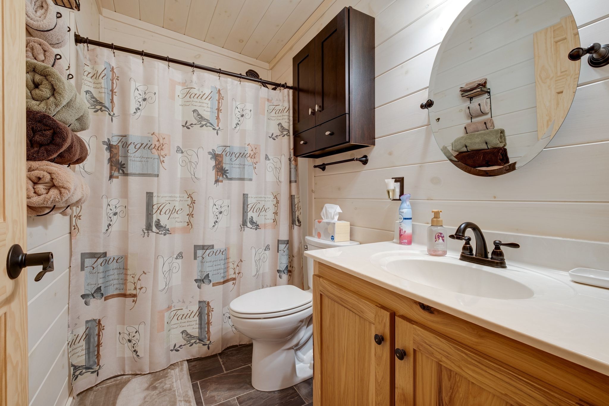 2614 Distillery Road Greenbrier, TN 37073 - Photo 22 of 34 a bathroom with a sink a toilet and shower curtain