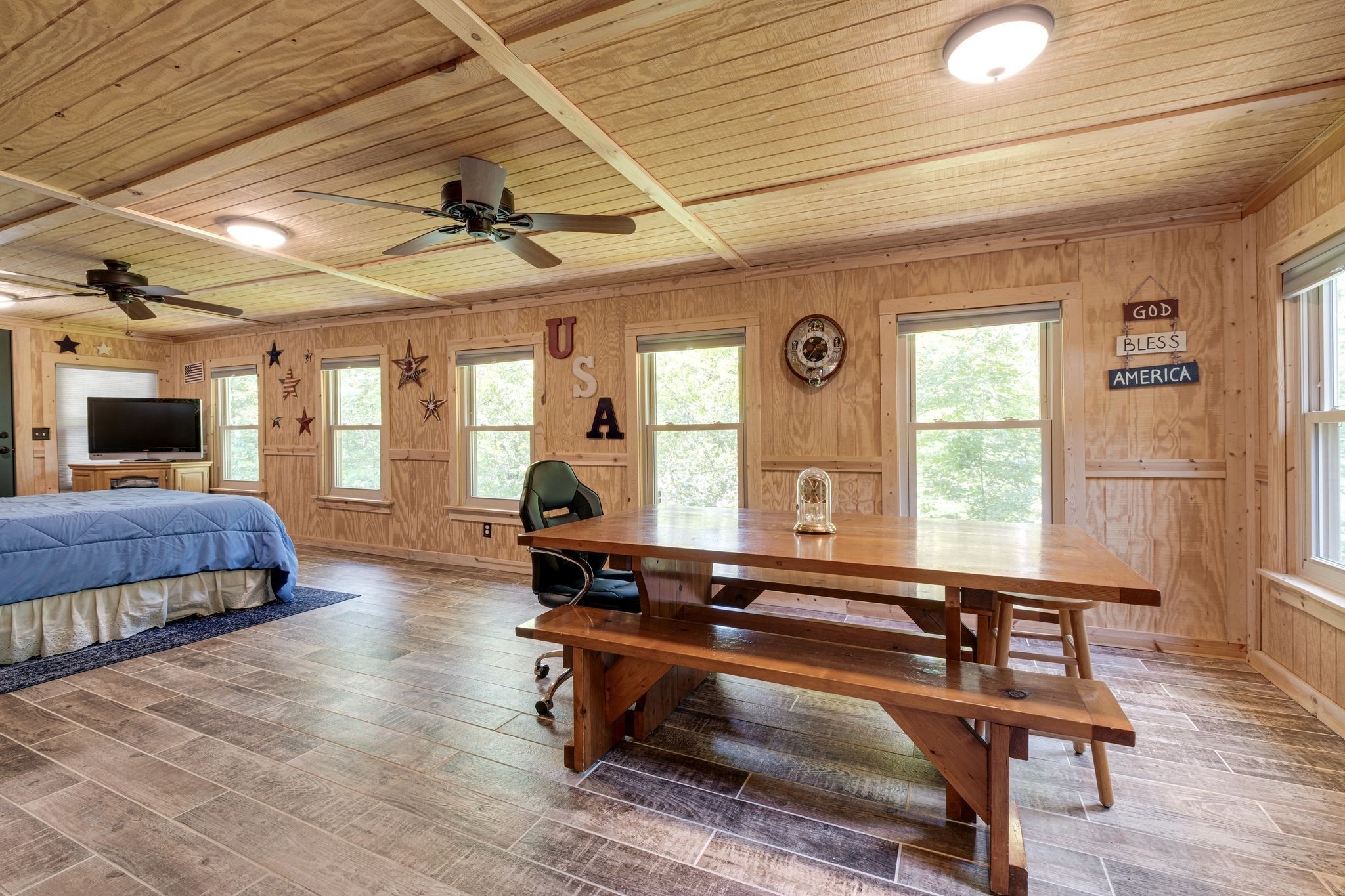 2614 Distillery Road Greenbrier, TN 37073 - Photo 25 of 34 a living room with a bed furniture and a window
