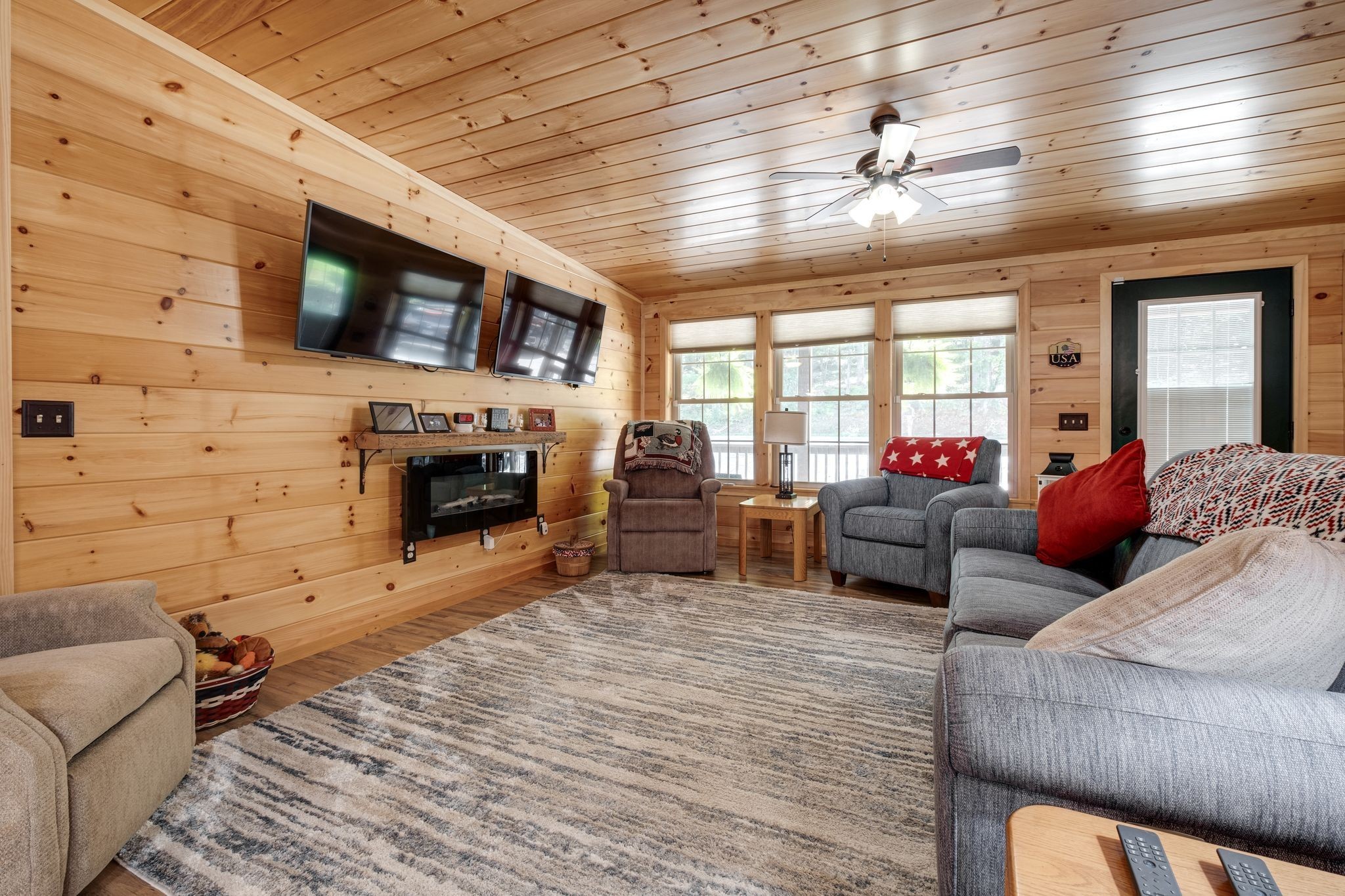 2614 Distillery Road Greenbrier, TN 37073 - Photo 6 of 34 a living room with furniture a fireplace and a flat screen tv