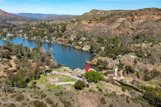 a view of a lake with mountains in the background