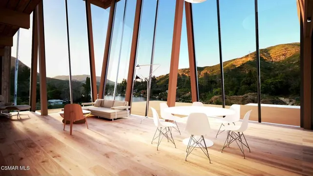 a view of porch with a table chairs and a table