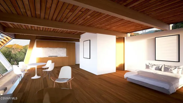 a living room with a large window and a table