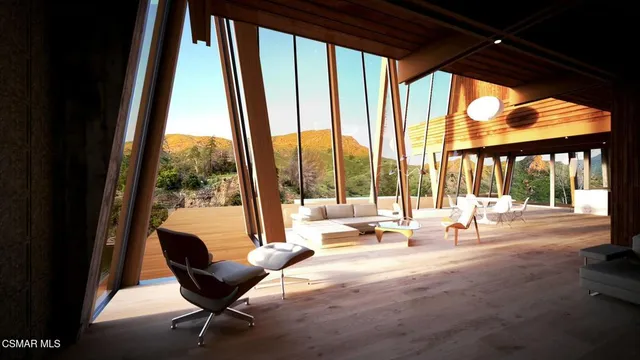 a view of a room with a large window