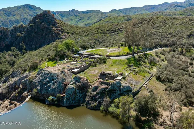 a view of a lake with a mountain
