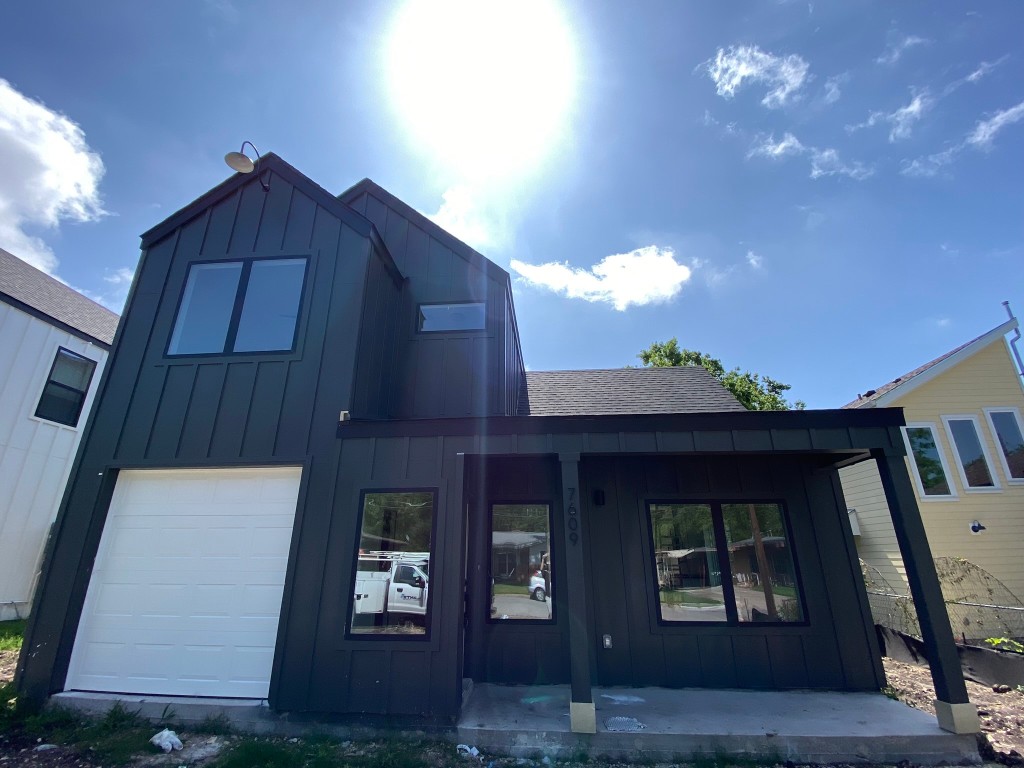 7609 Gault Street, Unit 1 Austin, TX 78757 - Photo 1 of 1 a view of a wooden door
