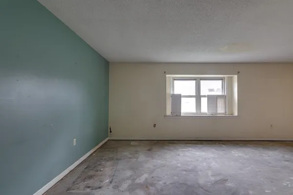 an empty room with a window