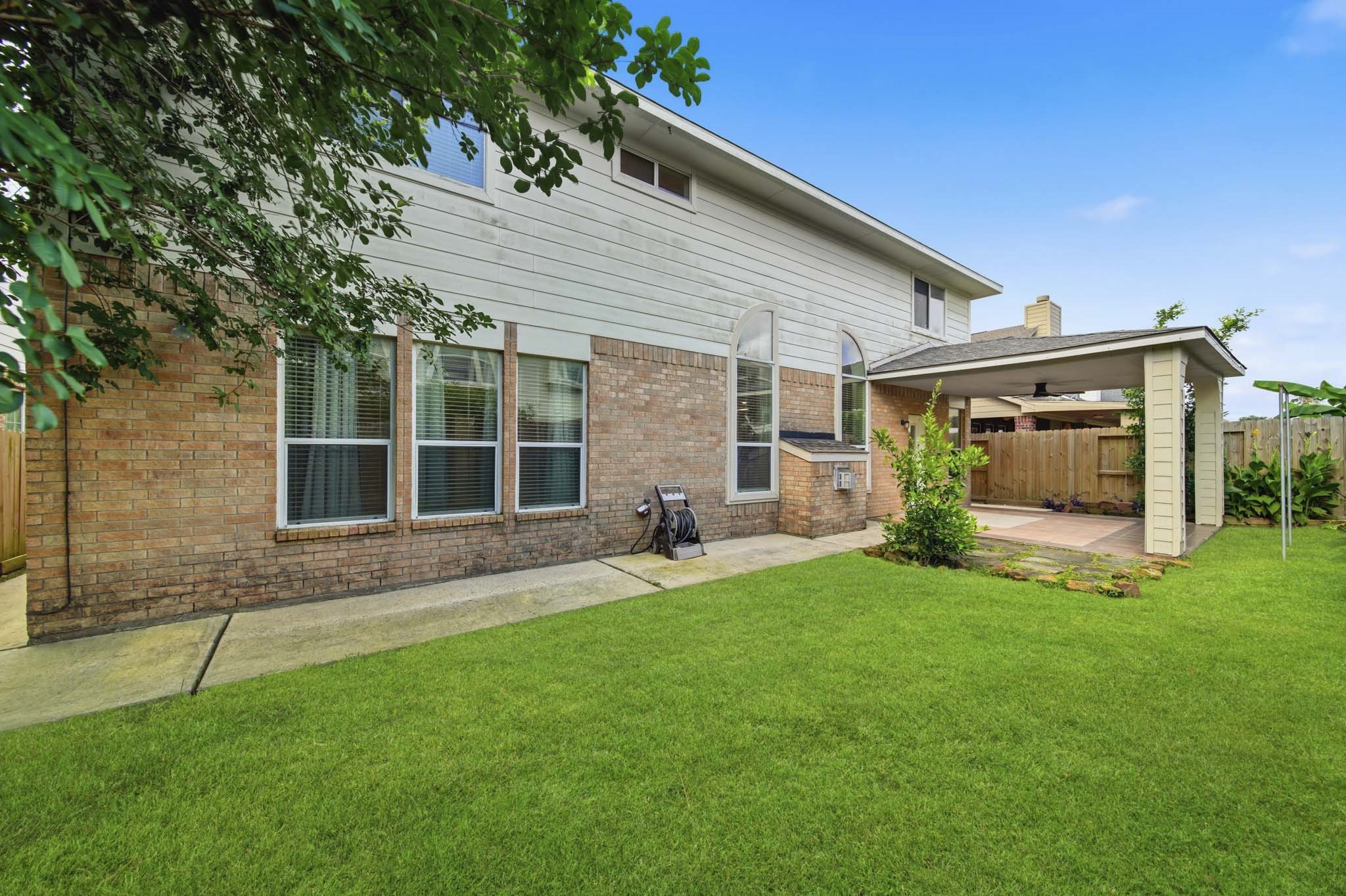 3306 Colleville Sur Mer Lane Spring, TX 77388 - Photo 26 of 30 Fully fenced for privacy, this backyard is both functional and inviting, making it an ideal place to enjoy the outdoors.