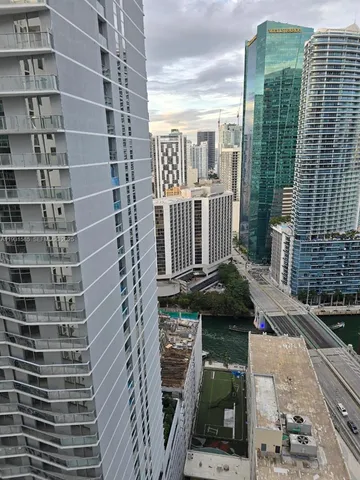 a front view of a building with a yard