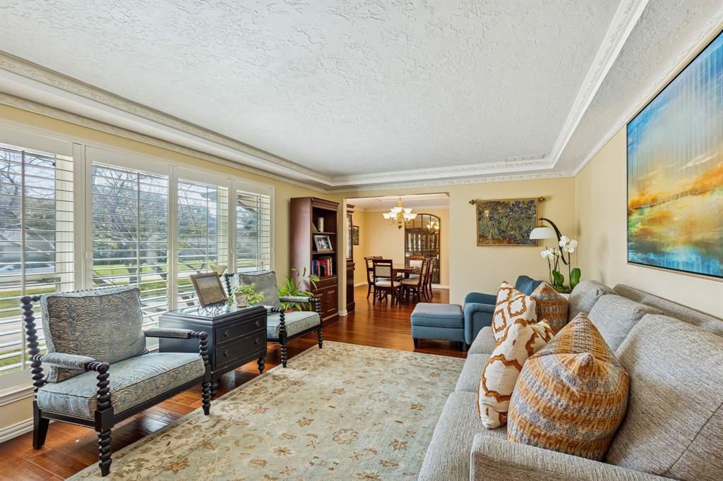 4475 Twin Post Road Dallas, TX 75244 - Photo 7 of 10 a living room with furniture and a large window