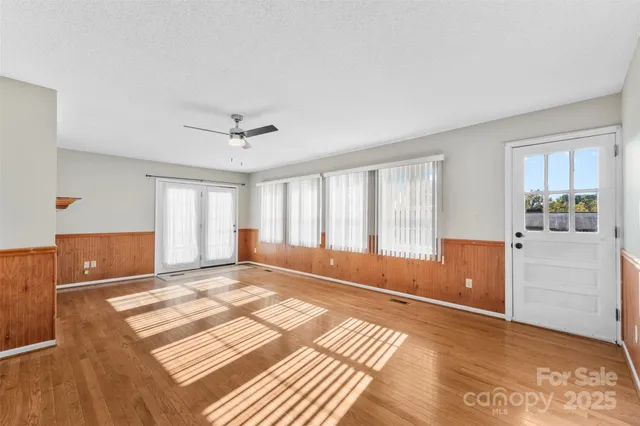 a view of a livingroom with wooden floor