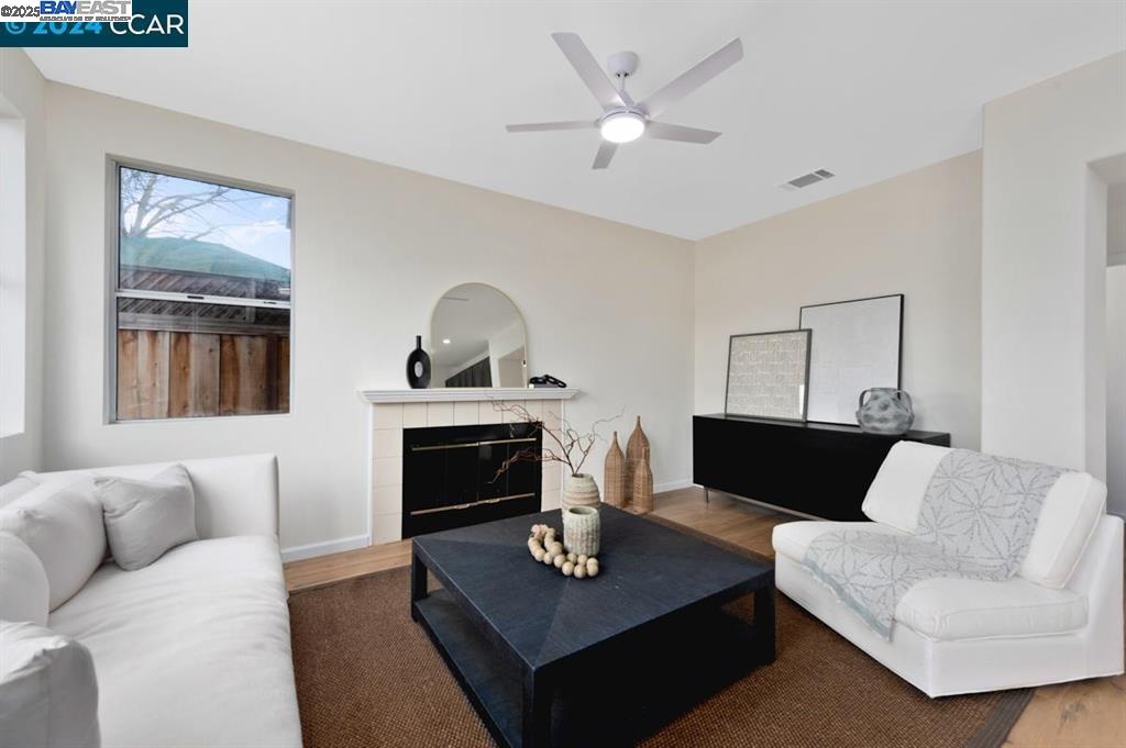 4433 Whitehoof Way Antioch, CA 94531 - Photo 16 of 31 a living room with furniture and a fireplace