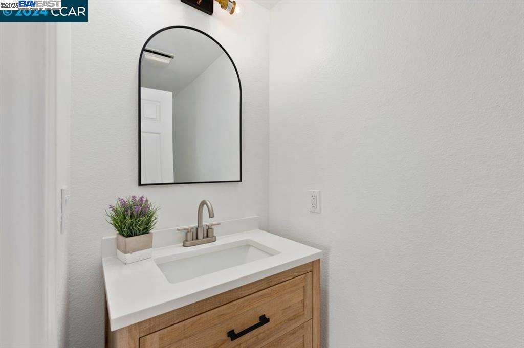 4433 Whitehoof Way Antioch, CA 94531 - Photo 18 of 31 a bathroom with a sink and a mirror
