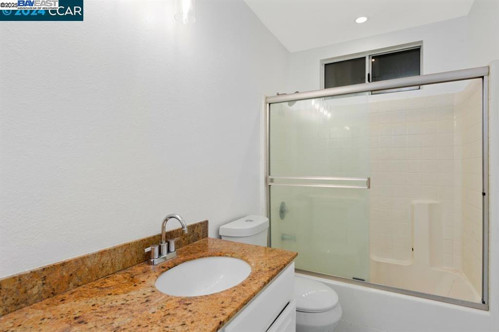 4433 Whitehoof Way Antioch, CA 94531 - Photo 24 of 31 a bathroom with a granite countertop sink toilet and shower