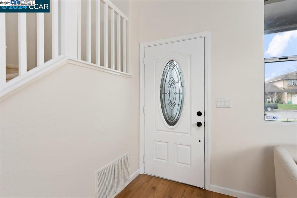 4433 Whitehoof Way Antioch, CA 94531 - Photo 5 of 31 a view of a hallway with wooden floor