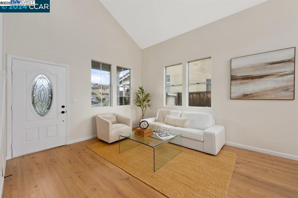 4433 Whitehoof Way Antioch, CA 94531 - Photo 7 of 31 a living room with furniture and a large window