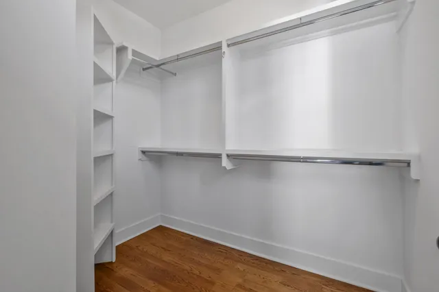 a view of an empty walk in closet