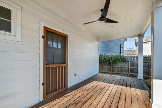 a view of outdoor space with deck and wooden floor