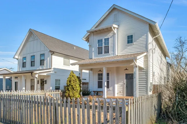a front view of a house with a porch