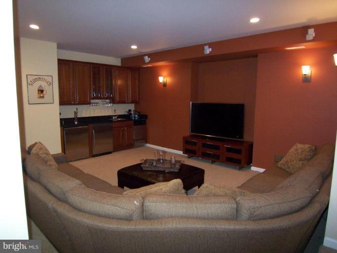 311 Riley Street Falls Church, VA 22046 - Photo 25 of 29 Sunken family room w/ great bar.