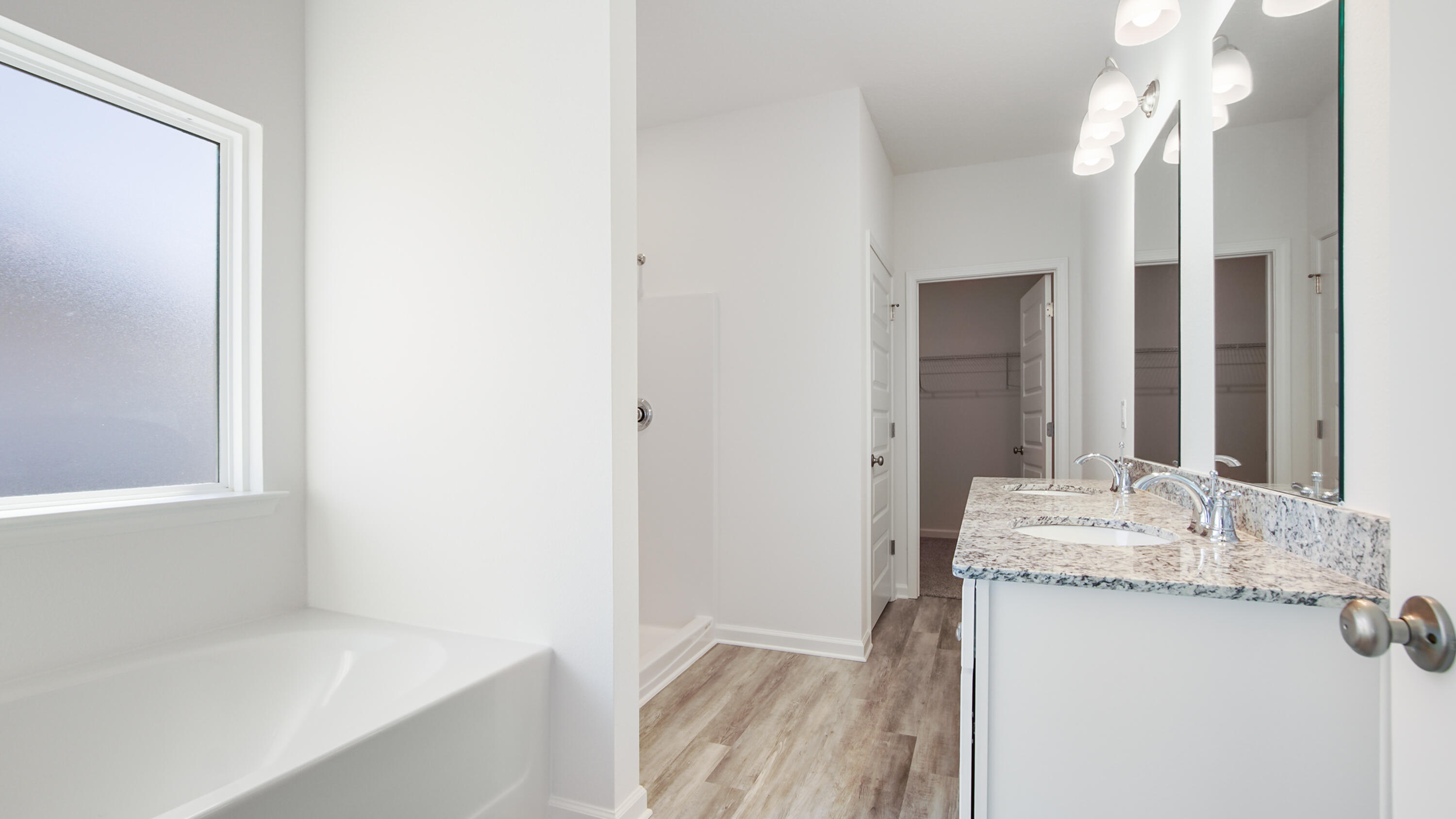180 Huckleberry Street Freeport, FL 32439 - Photo 18 of 33 a bathroom with a granite countertop sink and a mirror