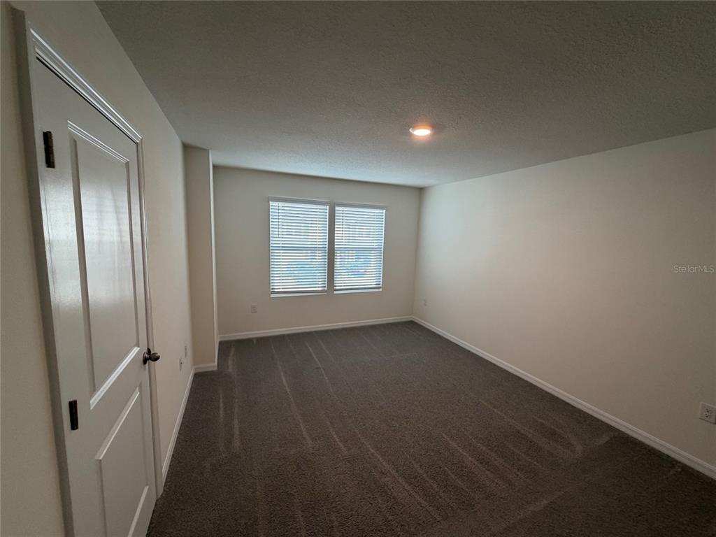 6685 South W 81st Loop Ocala, FL 34476 - Photo 11 of 31 an empty room with windows