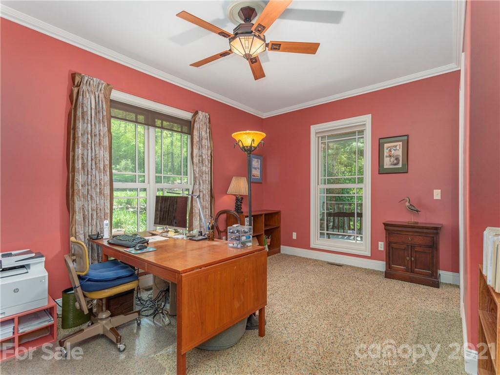 122 Jump Cove Road Weaverville, NC 28787 - Photo 16 of 48 a room with furniture and a window