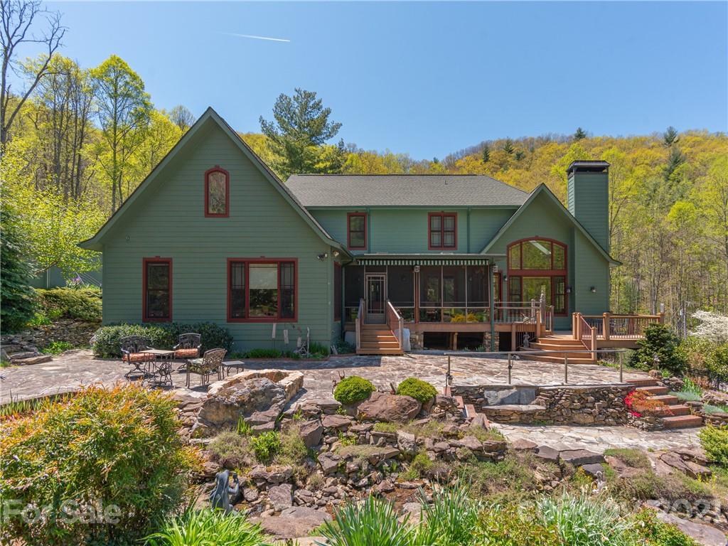 122 Jump Cove Road Weaverville, NC 28787 - Photo 33 of 48 a front view of a house with patio
