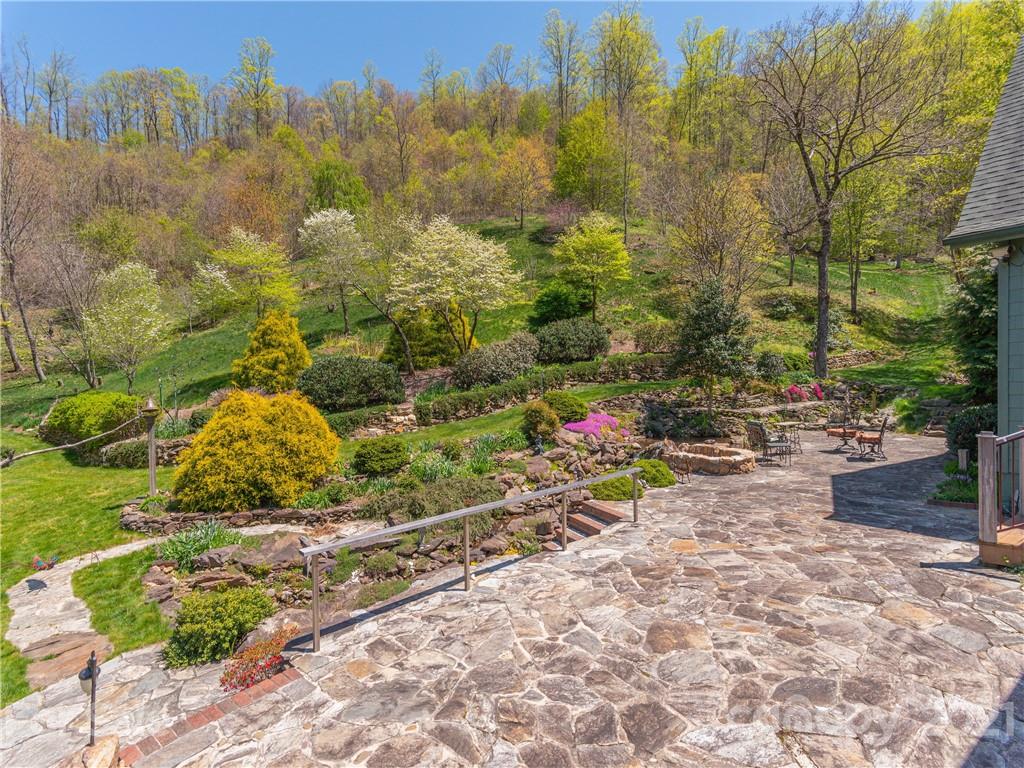 122 Jump Cove Road Weaverville, NC 28787 - Photo 36 of 48 a view of a backyard