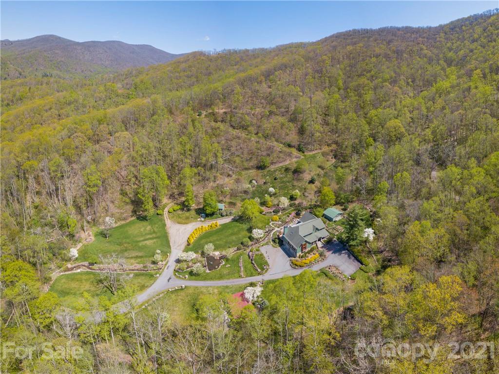 122 Jump Cove Road Weaverville, NC 28787 - Photo 48 of 48 a view of residential houses with outdoor space and trees
