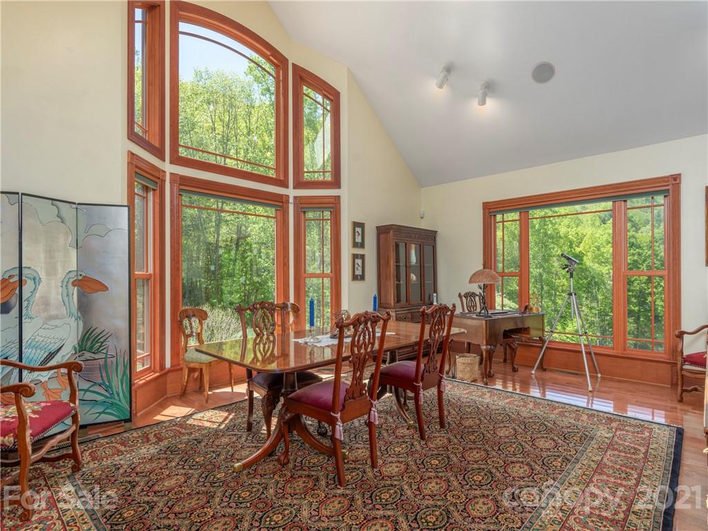 122 Jump Cove Road Weaverville, NC 28787 - Photo 7 of 48 a view of a dining room with furniture window and outside view