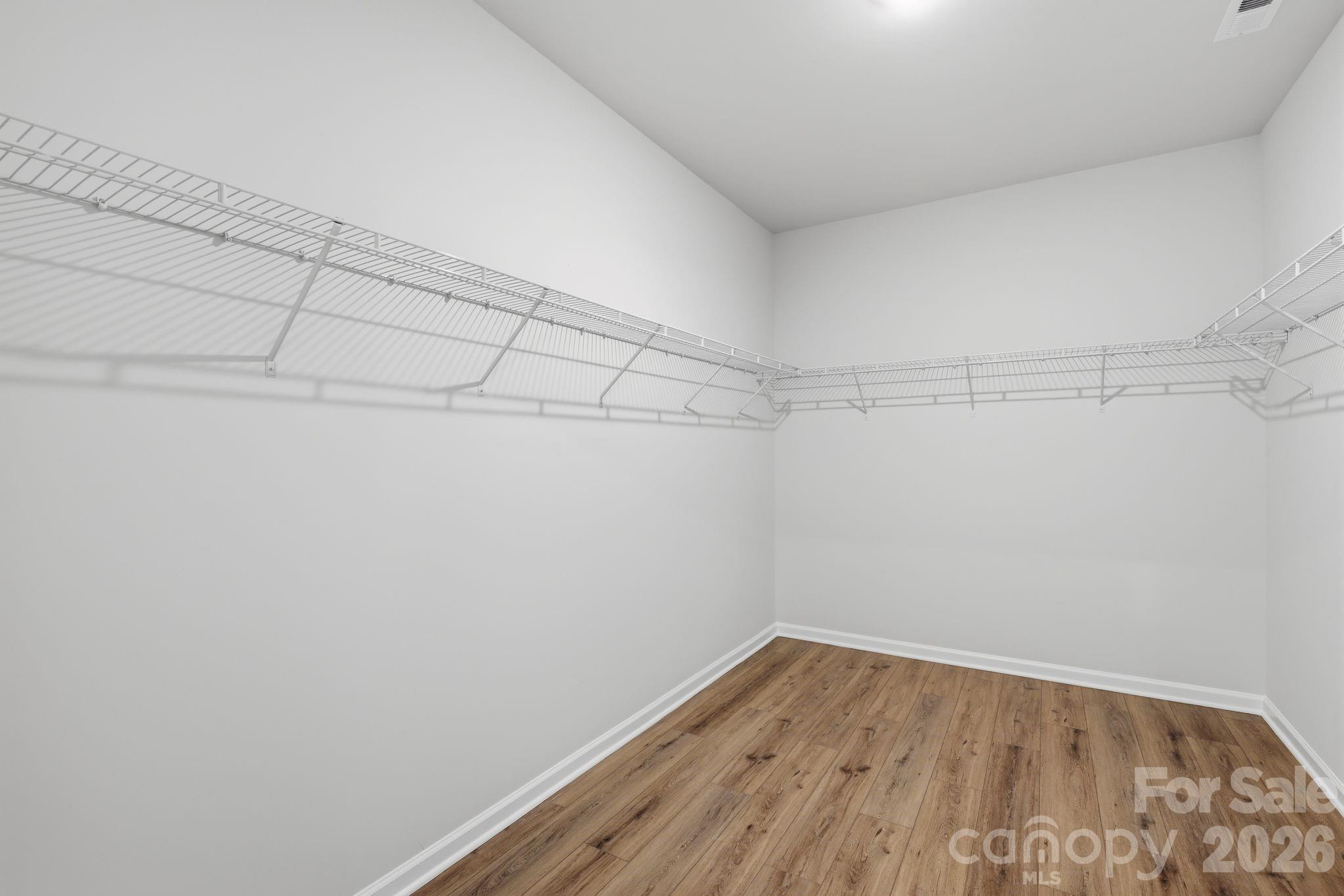 5475 Redbud Road, Unit 57 Lancaster, SC 29720 - Photo 28 of 30 a view of a room with wooden floor