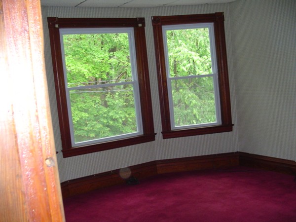 132 Hazel Street Fitchburg, MA 01420 - Photo 4 of 13 a view of an empty room with a window