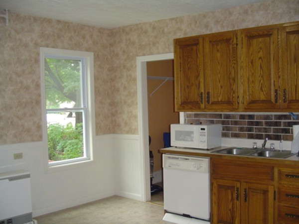 132 Hazel Street Fitchburg, MA 01420 - Photo 6 of 13 a kitchen with a sink and a window