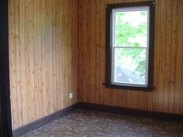 132 Hazel Street Fitchburg, MA 01420 - Photo 8 of 13 a view of an empty room with a window