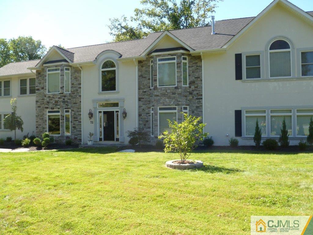 72 Stafford Road Colonia, NJ 07067 - Photo 1 of 20 a view of a house with a swimming pool