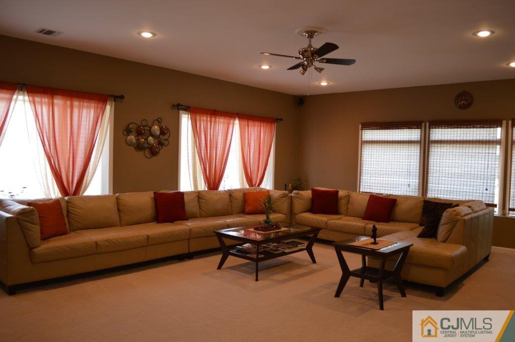 72 Stafford Road Colonia, NJ 07067 - Photo 4 of 20 a living room with furniture and a large window
