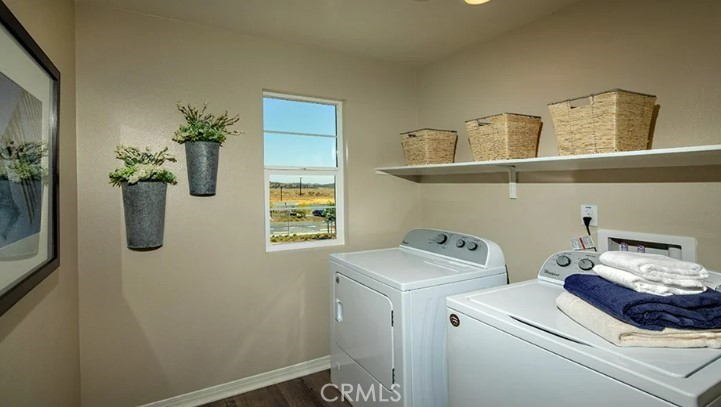36838 Arietta Way Beaumont, CA 92223 - Photo 17 of 26 a utility room with dryer and washer
