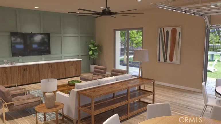 36838 Arietta Way Beaumont, CA 92223 - Photo 25 of 26 a room with furniture and a flat screen tv