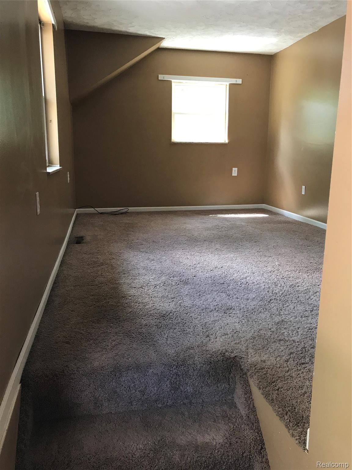 9117 Bennett Lake Road Fenton, MI 48430 - Photo 25 of 29 Second Floor Rec Area