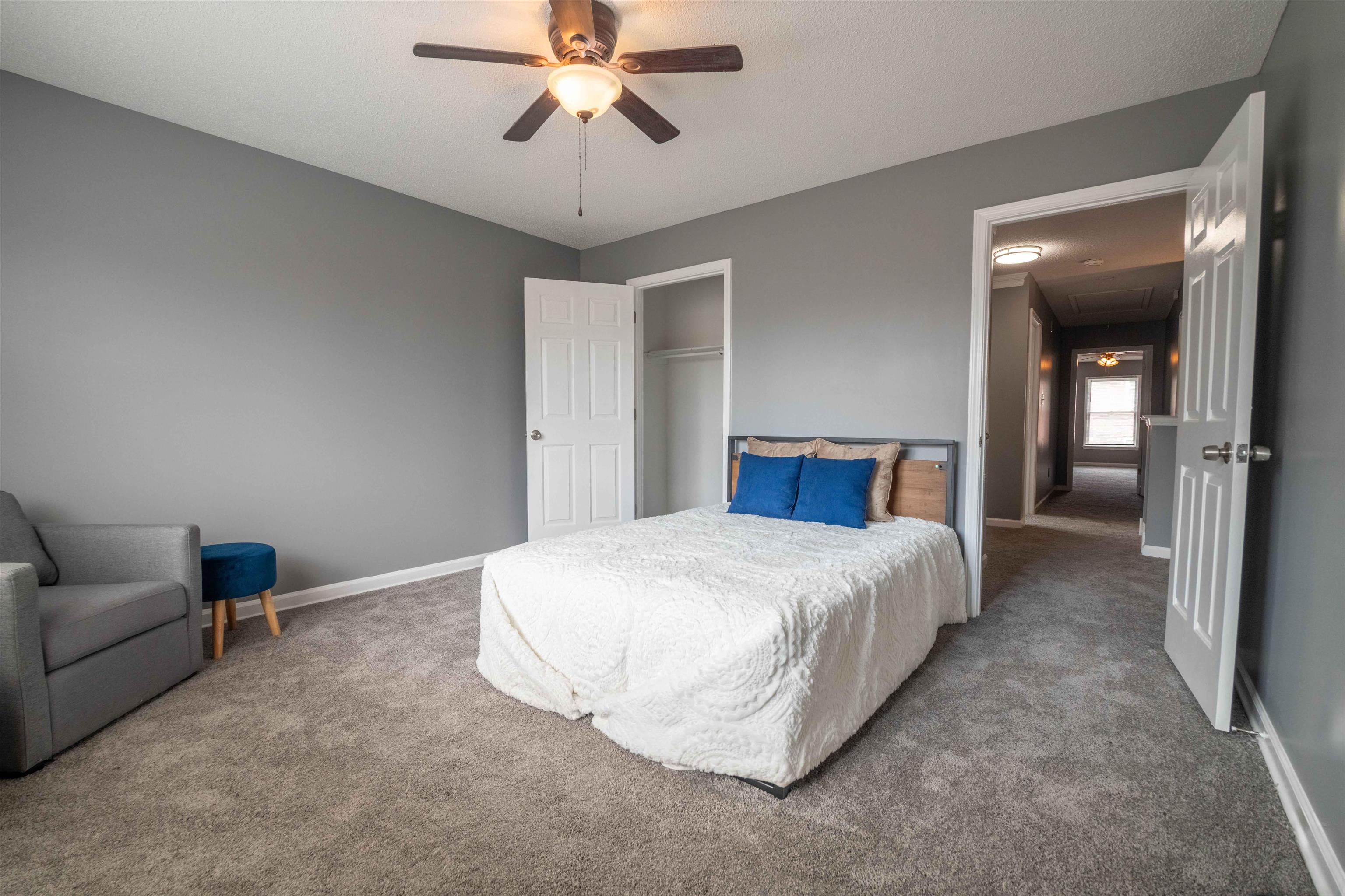 2630 Davies Plantation Road Memphis, TN 38016 - Photo 31 of 37 Bedroom featuring carpet, ceiling fan, and a closet