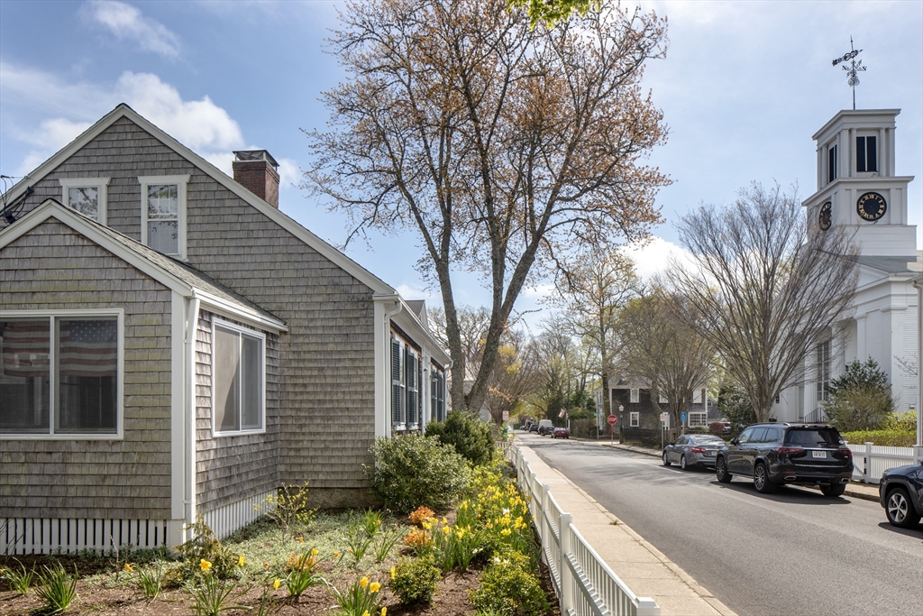 31 Main Street Marion, MA 02738 - Photo 19 of 29 a view of a parked cars in front of a house