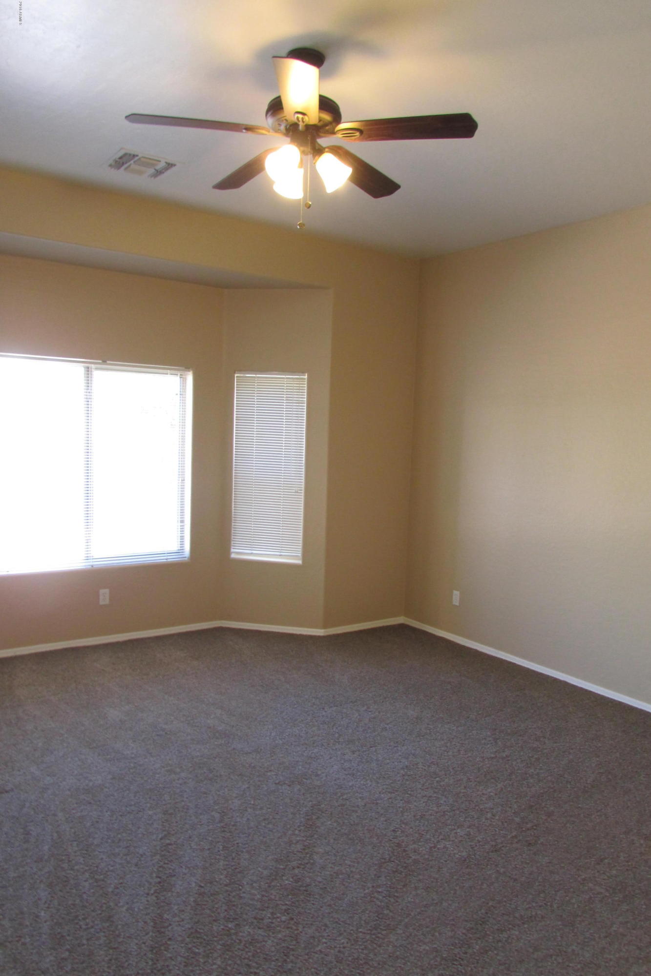 716 East Ranch Road Gilbert, AZ 85296 - Photo 14 of 22 a view of an empty room with a window