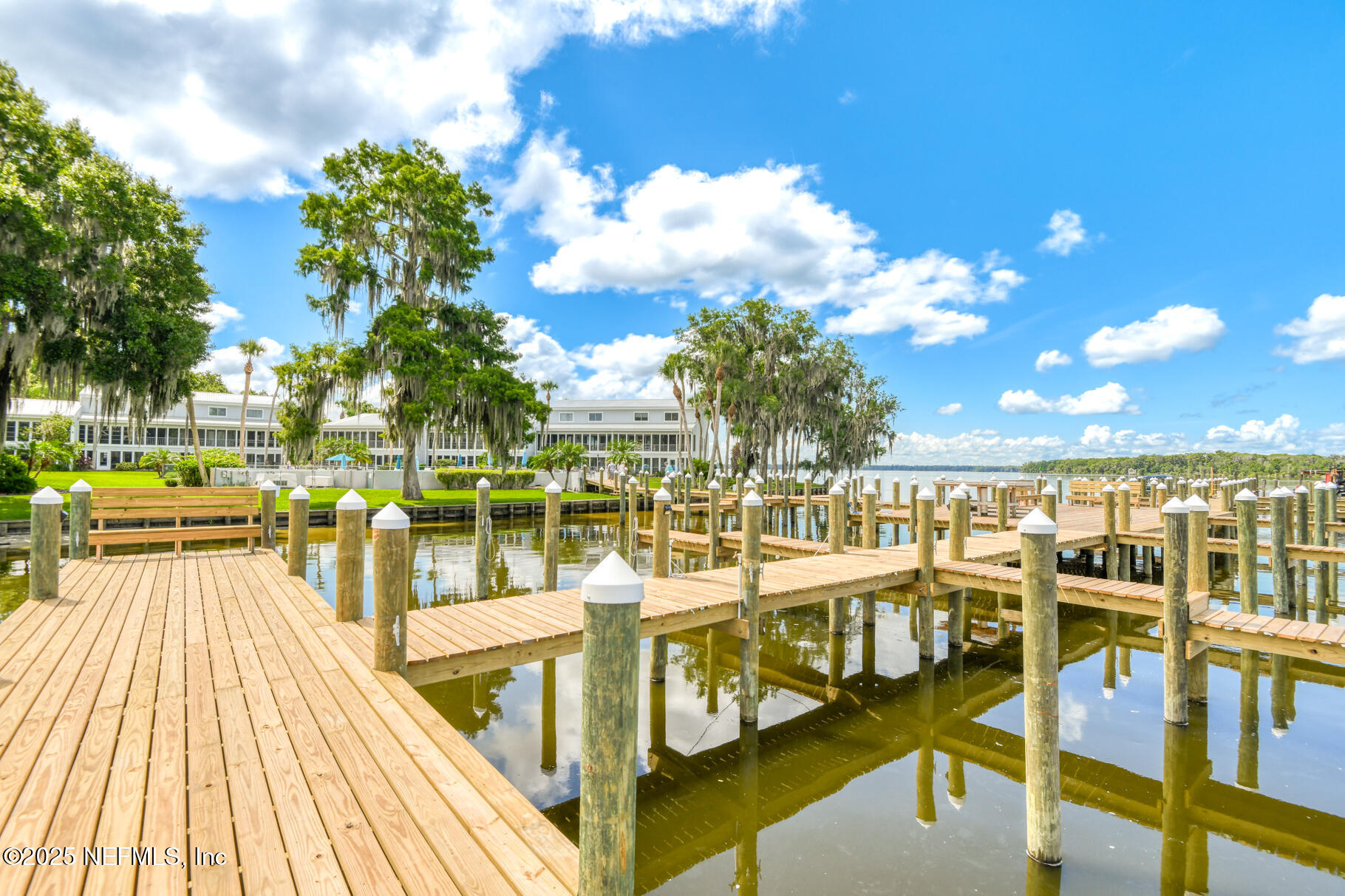 222 River Bend Court, Unit BLDG C Welaka, FL 32193 - Photo 26 of 49 a view of a swimming pool with a chairs