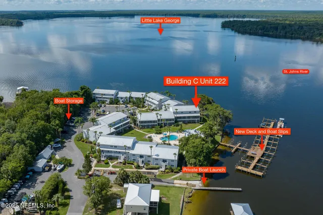 a view of swimming pool with a lake view