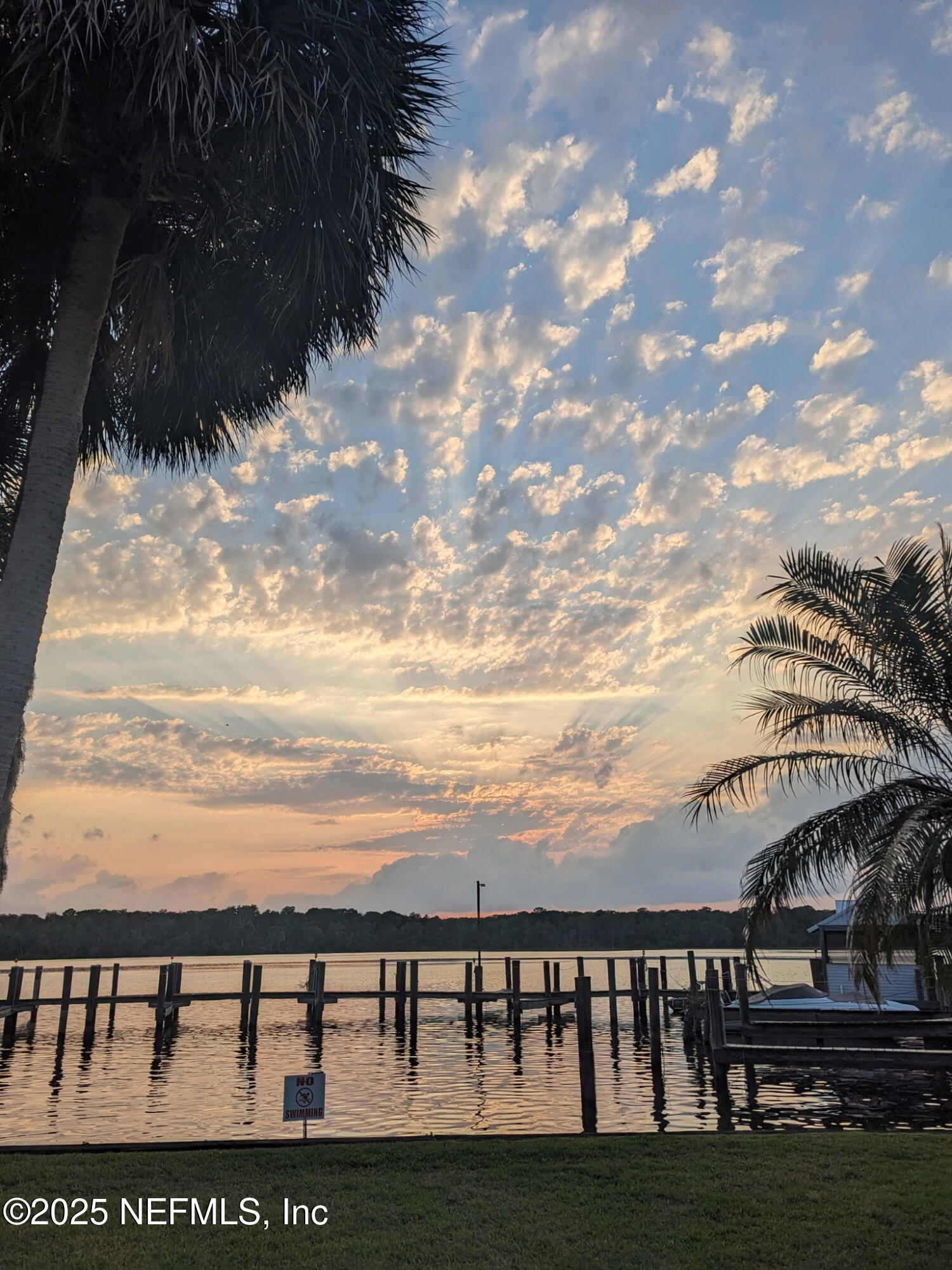 222 River Bend Court, Unit BLDG C Welaka, FL 32193 - Photo 48 of 49 a view of swimming pool with outdoor seating